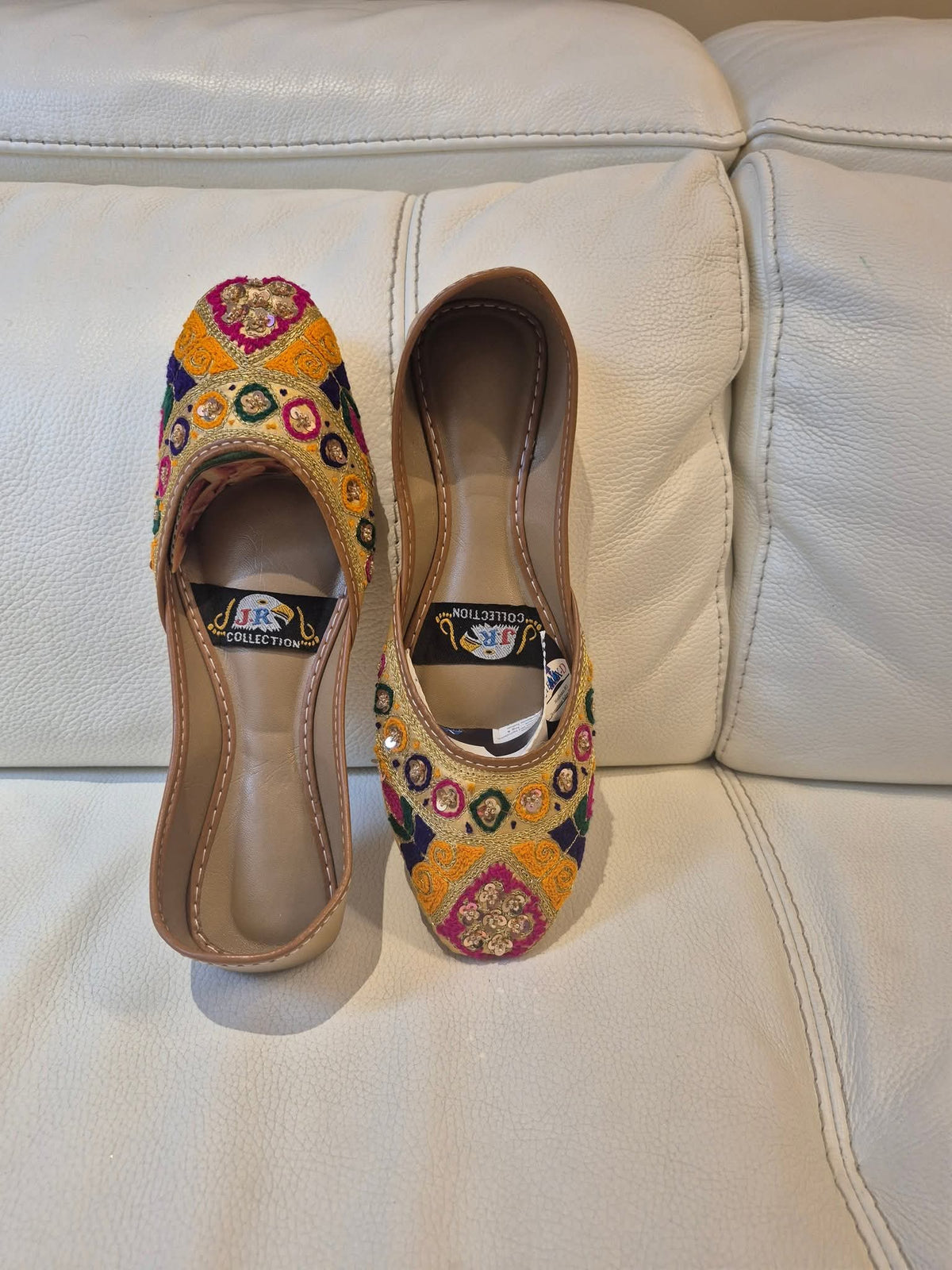 Bright yellow khussa with colourful embroidery