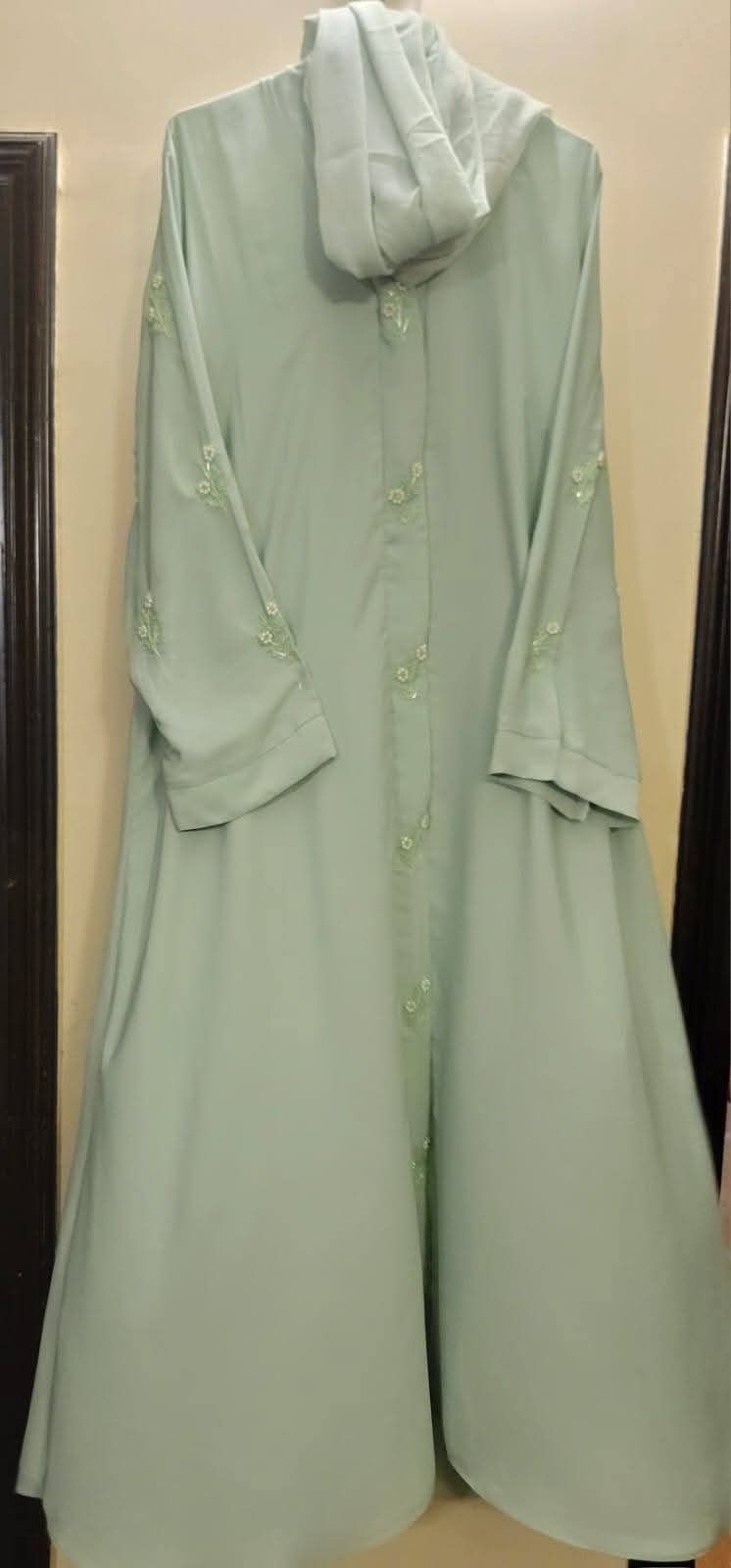 Light coloured abayas