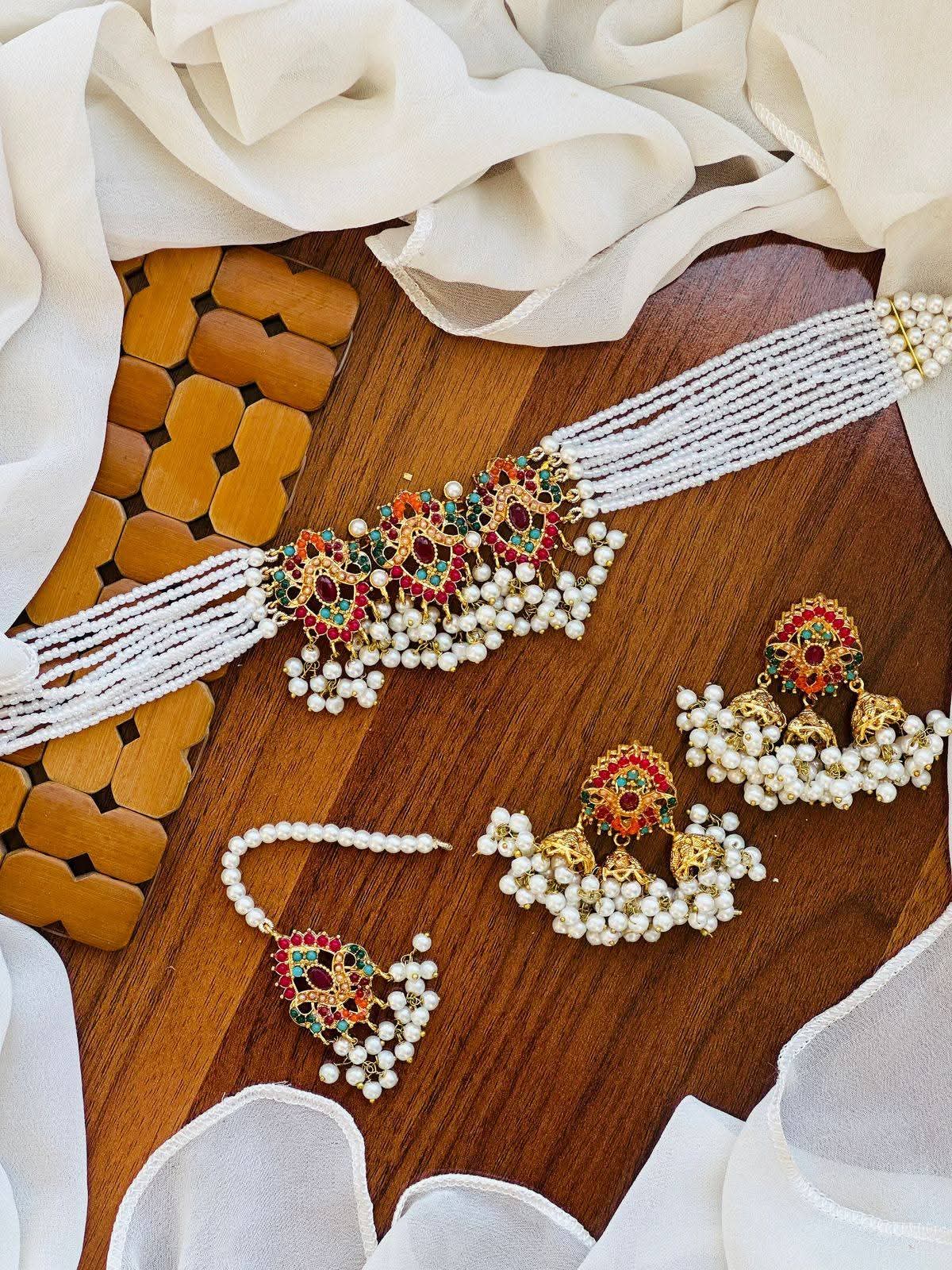 Traditional Multi-Strand Pearl Choker Jewellery Set with Jhumkas & Maang Tikka