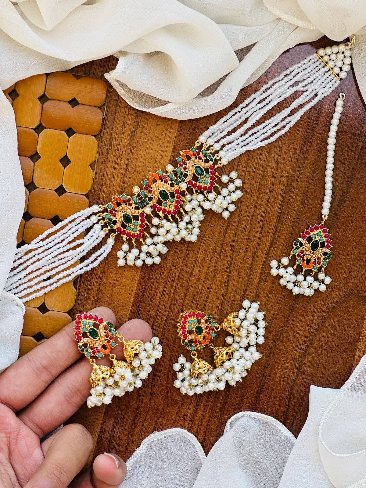 Traditional Multi-Strand Pearl Choker Jewellery Set with Jhumkas & Maang Tikka
