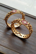 Antique Gold-Plated Textured Kangan Bangles Set with Ruby Accents
