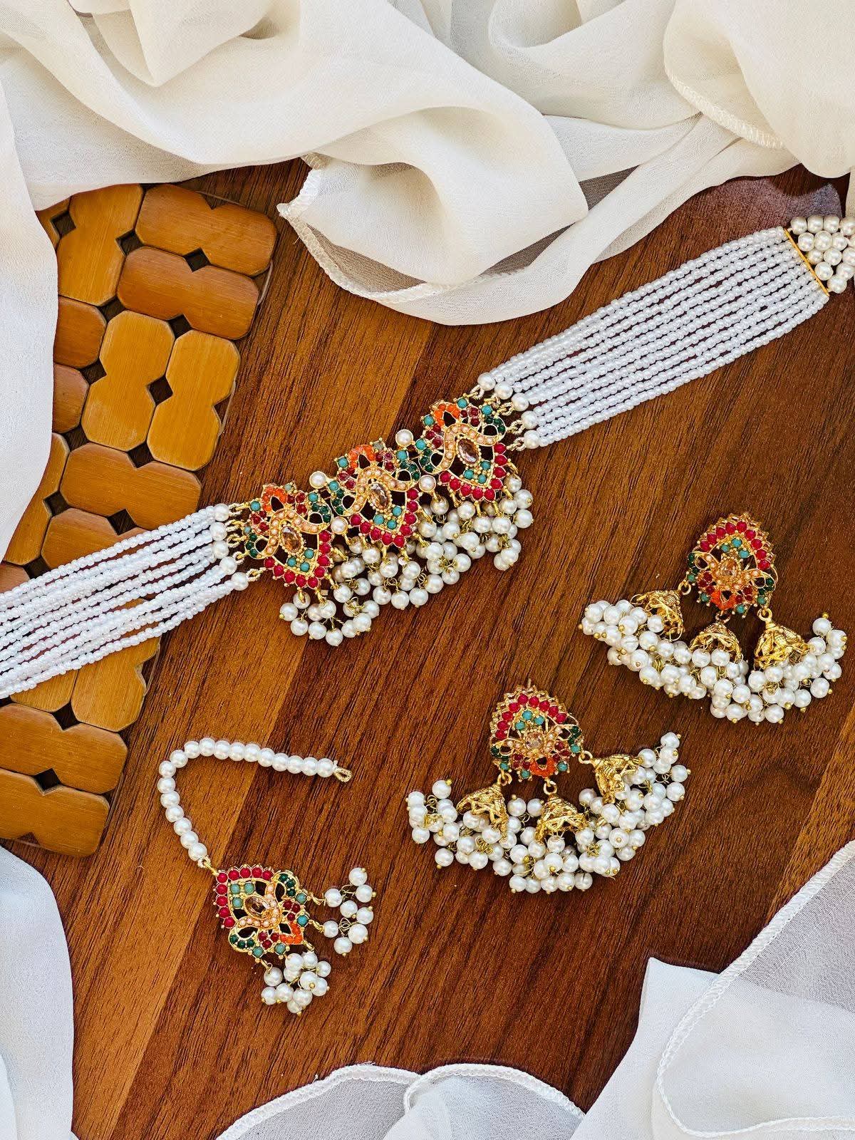 Traditional Multi-Strand Pearl Choker Jewellery Set with Jhumkas & Maang Tikka