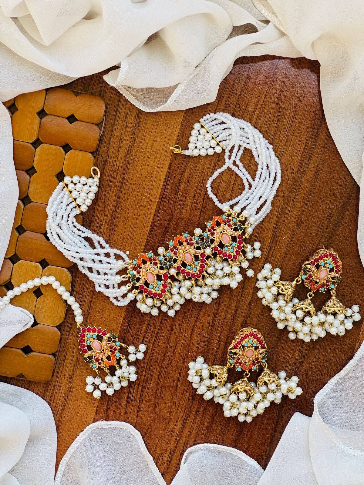 Traditional Multi-Strand Pearl Choker Jewellery Set with Jhumkas & Maang Tikka