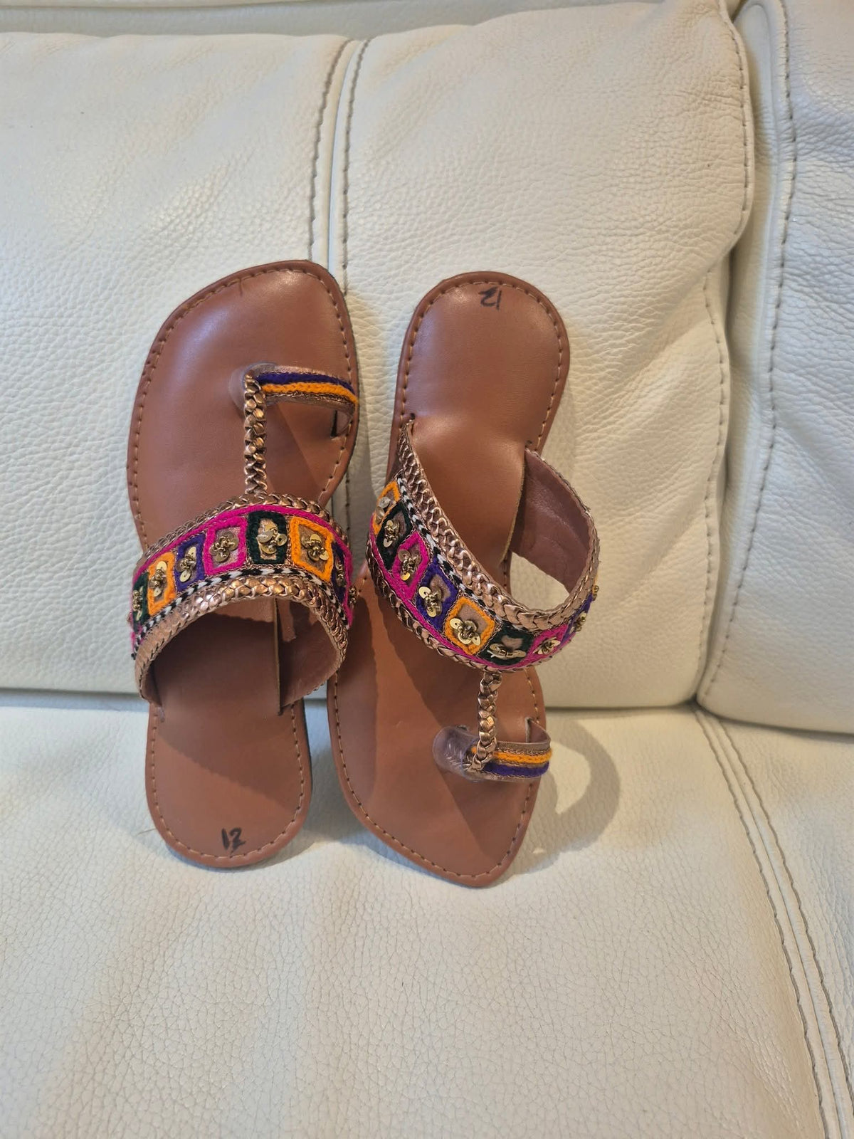 Embellished multi-color patch Kolhapuri flat sandal.