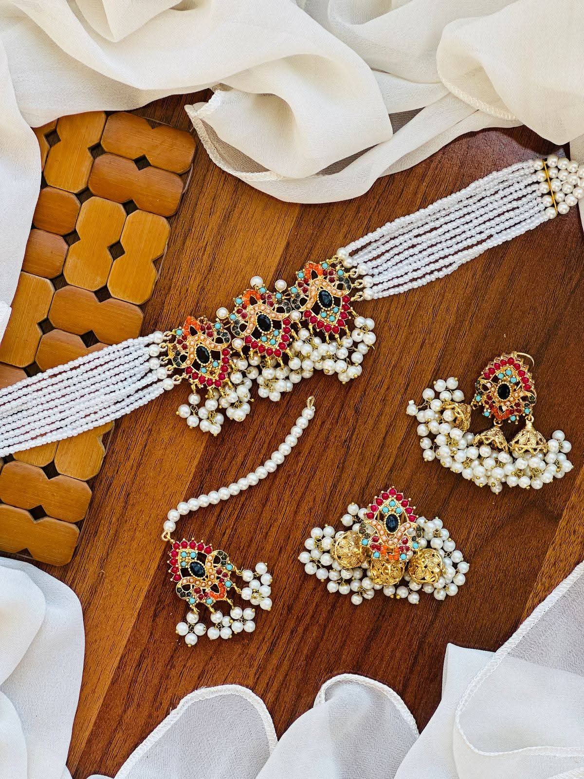 Traditional Multi-Strand Pearl Choker Jewellery Set with Jhumkas & Maang Tikka